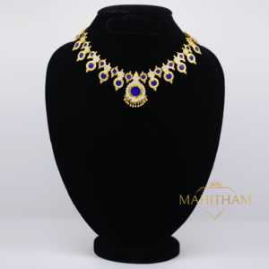 South Indian traditional one gram gold plated blue mahima palakka necklace with white amercan diamond stones. This is precious and premium piece of jewellery exclusively for women